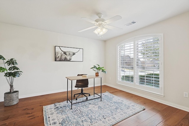 office area with dark hardwood / wood-style floors and ceiling fan