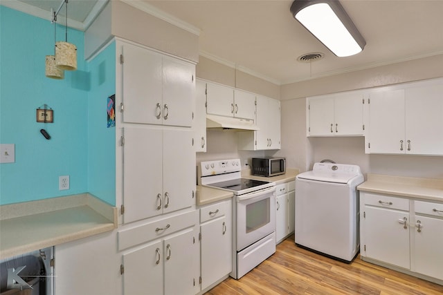 kitchen with white range with electric cooktop, white cabinets, decorative light fixtures, and washer / dryer