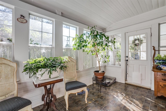 sunroom with wood ceiling and vaulted ceiling