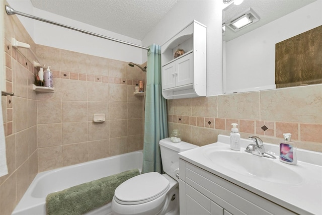 full bathroom featuring shower / bath combination with curtain, a textured ceiling, toilet, decorative backsplash, and vanity