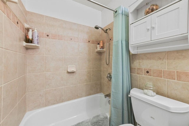 bathroom with tasteful backsplash, toilet, tile walls, and shower / tub combo with curtain