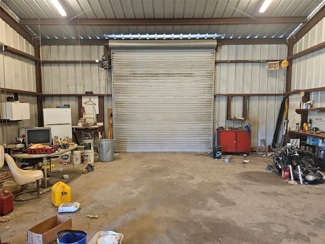 garage featuring white refrigerator