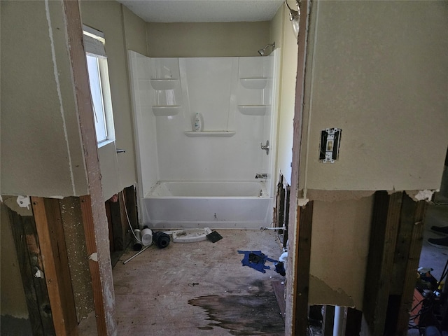 bathroom featuring washtub / shower combination