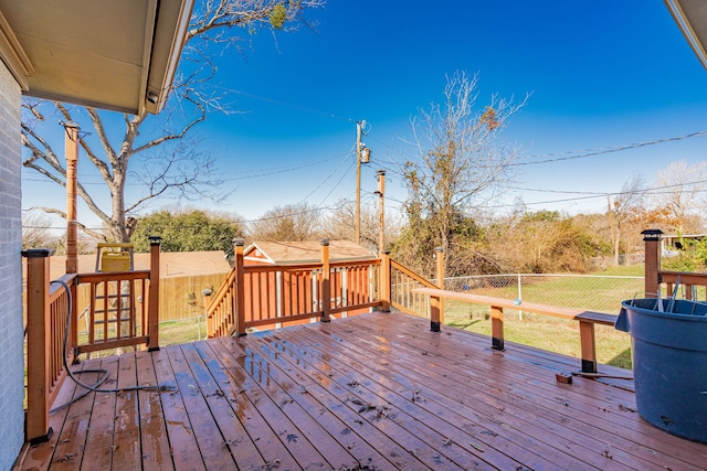 deck featuring a yard