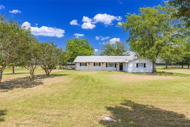 ranch-style house with a front lawn