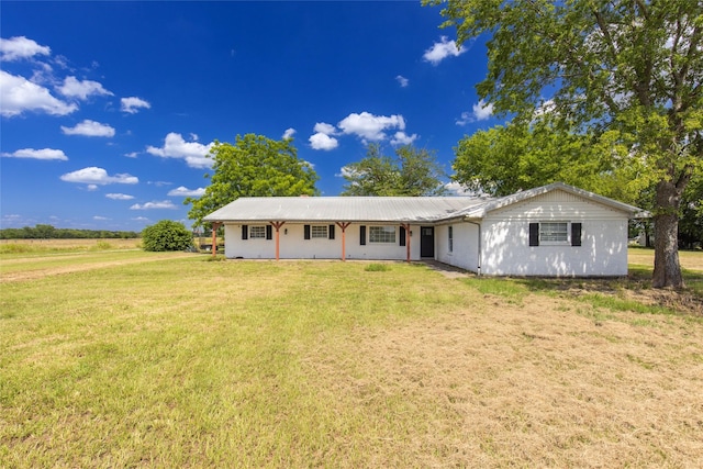 ranch-style house with a front yard