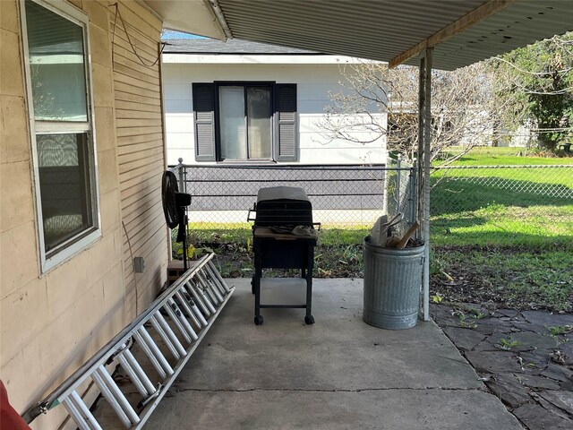 view of patio featuring a grill