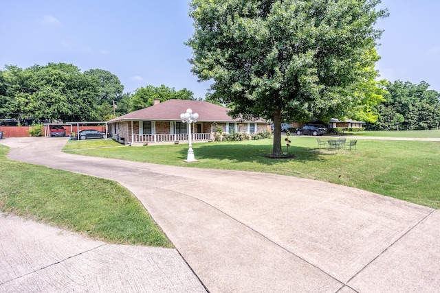 single story home featuring a front yard and a porch