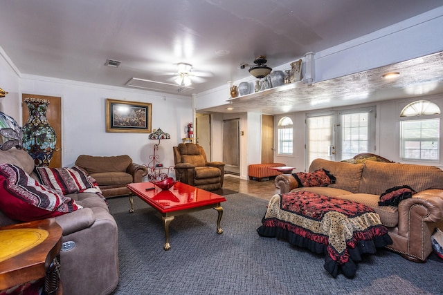 living room with ceiling fan and french doors