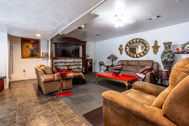 living room with a textured ceiling