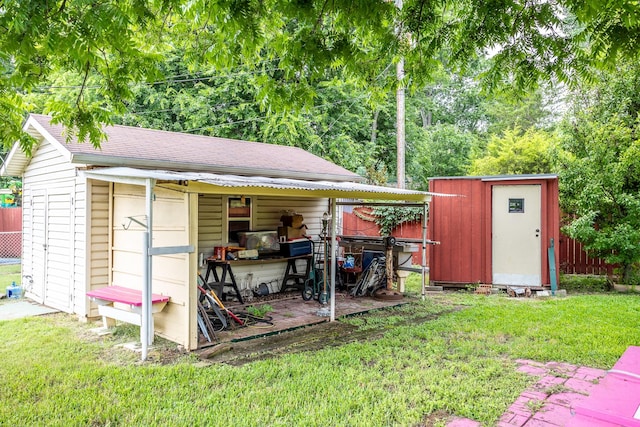 view of outdoor structure with a yard