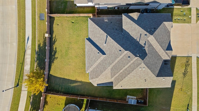 rear view of property featuring a lawn and a patio