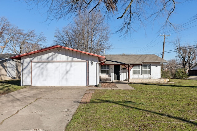 ranch-style home with a garage and a front lawn