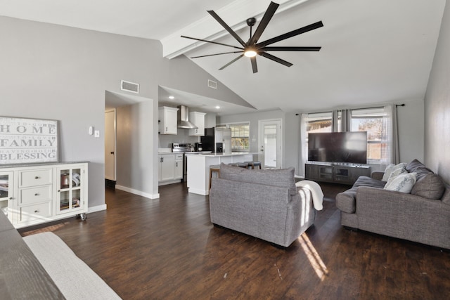 living room with ceiling fan, dark wood-type flooring, and lofted ceiling with beams