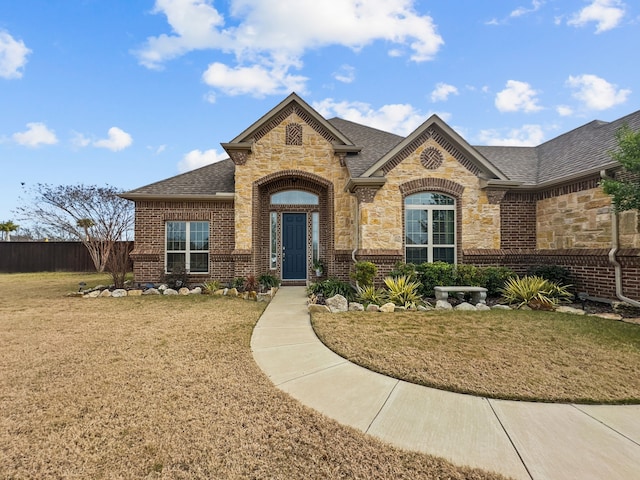 view of front facade with a front lawn