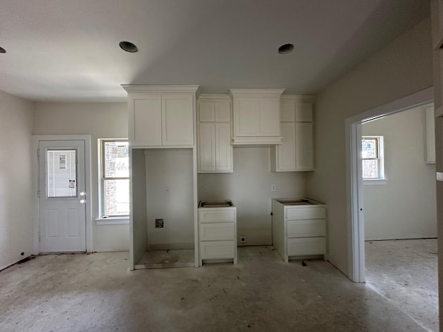 612 N US Highway 69, Celeste, TX 75423 - kitchen featuring white cabinetry