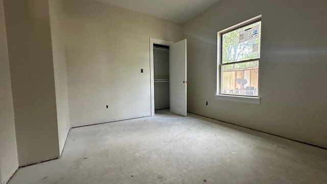 unfurnished bedroom with multiple windows