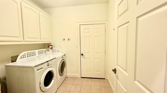 1505 Cross Oaks Ct, Graham, TX 76450 - laundry room with independent washer and dryer, light tile patterned floors, cabinet space, and baseboards