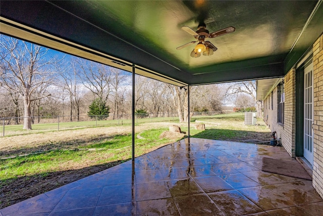 view of patio with a fenced backyard, a ceiling fan, and cooling unit