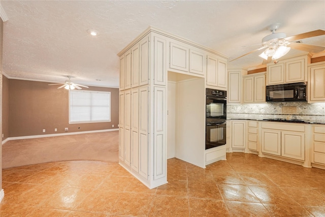 kitchen featuring tasteful backsplash, cream cabinets, ceiling fan, and black appliances