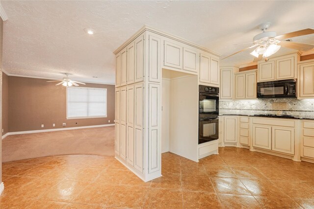 kitchen featuring ceiling fan, cream cabinets, black appliances, a textured ceiling, and decorative backsplash