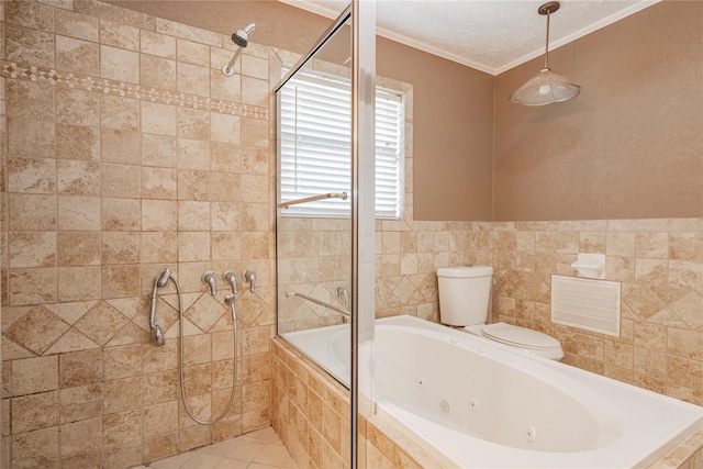 bathroom featuring crown molding, toilet, tiled shower, tile walls, and a tub with jets