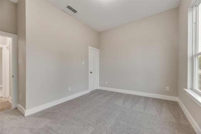 view of carpeted spare room