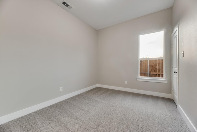 view of carpeted spare room