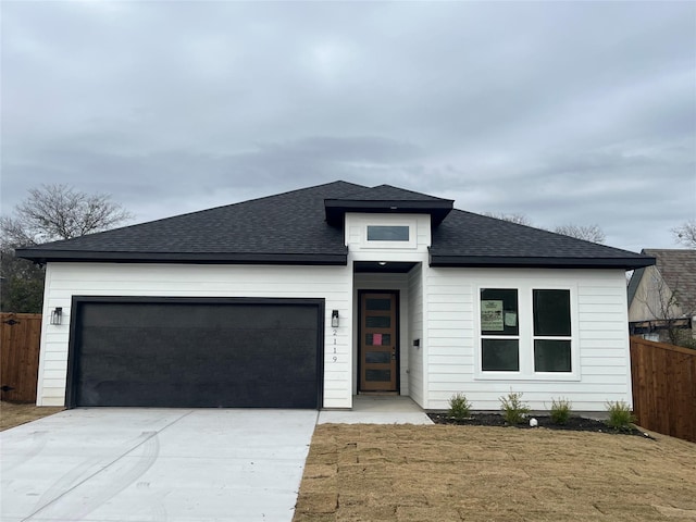 view of front of house with a garage