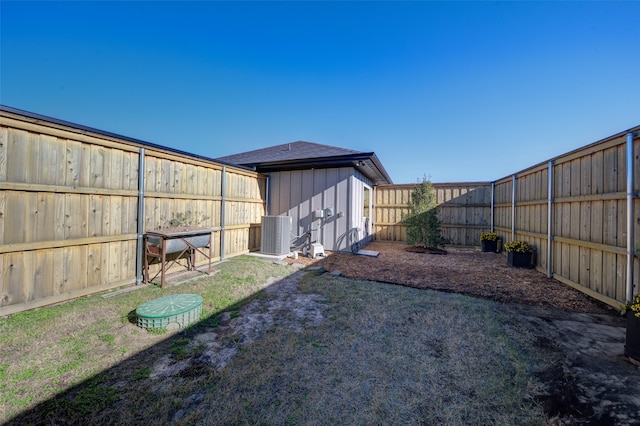 view of yard with central AC