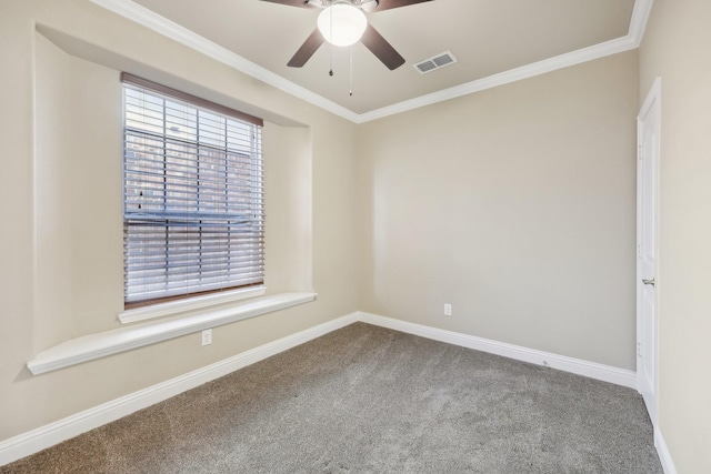 carpeted empty room featuring ceiling fan and ornamental molding