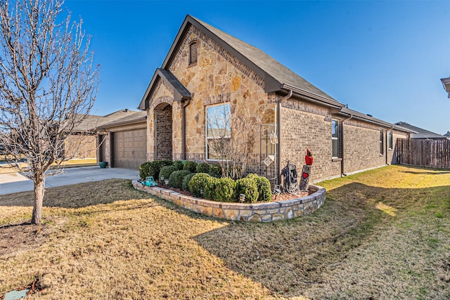 view of home's exterior with a lawn and a garage