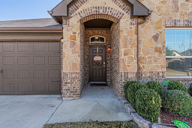 entrance to property featuring a garage