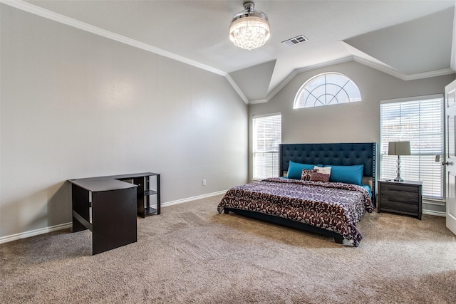 bedroom featuring crown molding, lofted ceiling, carpet floors, and a chandelier