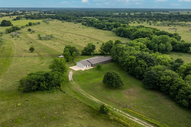 birds eye view of property featuring a rural view