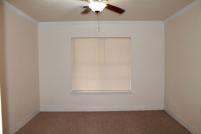 carpeted empty room featuring ornamental molding and ceiling fan