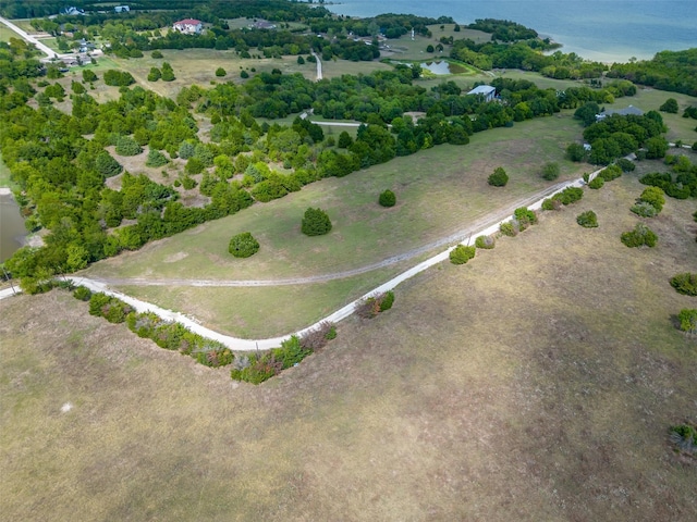 drone / aerial view featuring a rural view and a water view