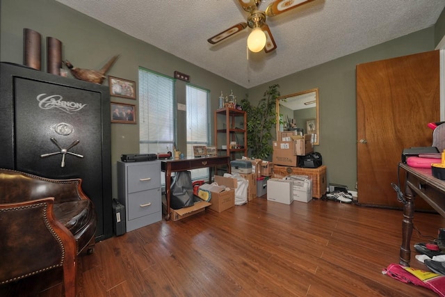 office with ceiling fan, a textured ceiling, and hardwood / wood-style flooring