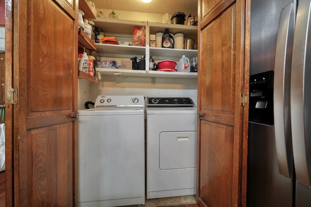 washroom featuring independent washer and dryer