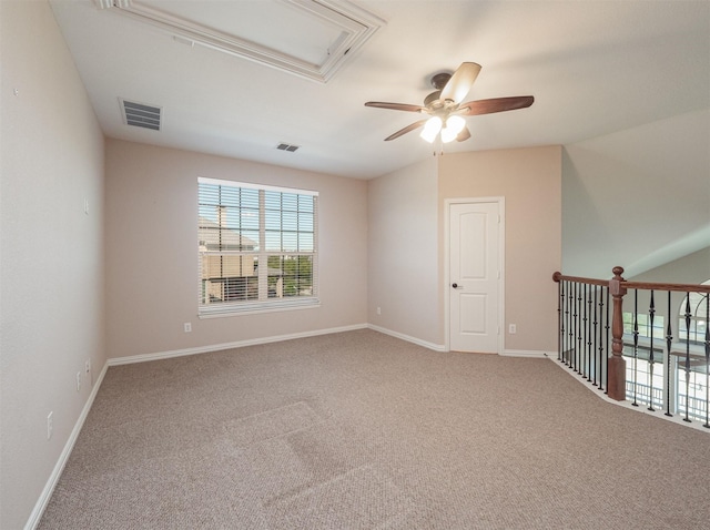 unfurnished room featuring carpet and ceiling fan