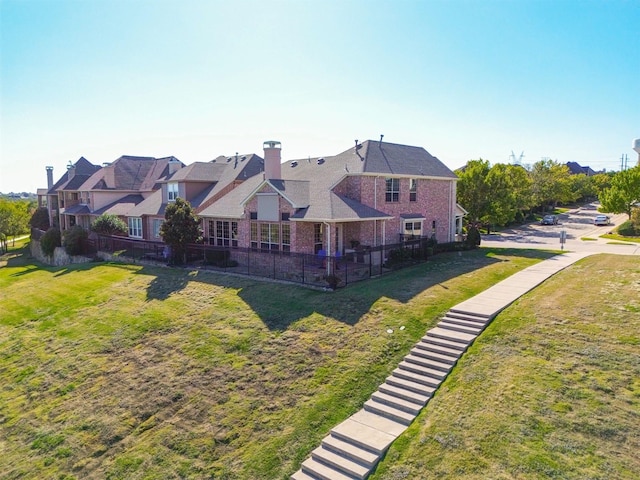 view of front facade with a front lawn