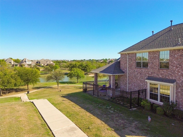 view of yard with a water view