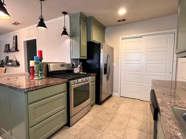 kitchen with green cabinetry, ornamental molding, light tile patterned floors, decorative light fixtures, and stainless steel appliances