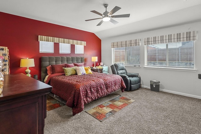 bedroom with carpet floors, vaulted ceiling, and ceiling fan