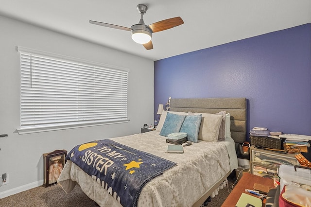 bedroom with ceiling fan and carpet