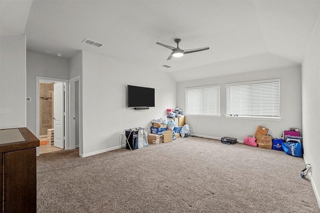 recreation room featuring carpet, ceiling fan, and lofted ceiling