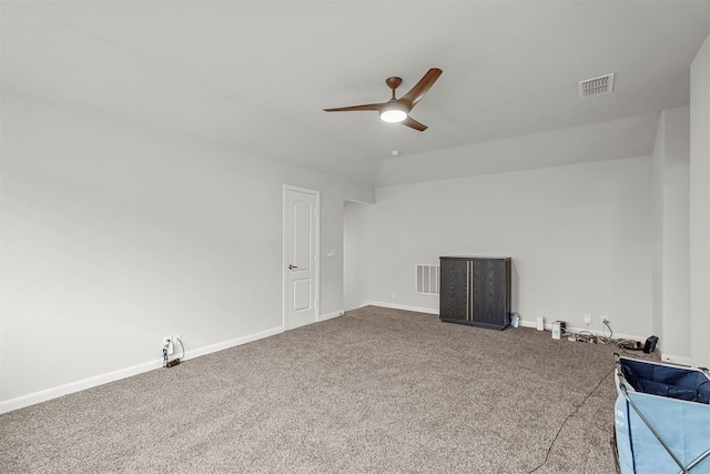 spare room with carpet flooring, ceiling fan, and lofted ceiling