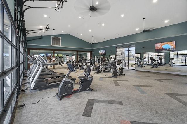 gym with light carpet, high vaulted ceiling, and ceiling fan