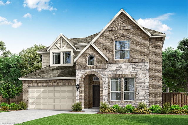 view of front facade with a garage and a front lawn