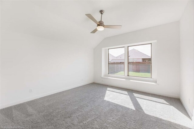 bonus room featuring ceiling fan, carpet, and vaulted ceiling